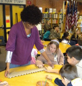 Mrs. Miller sharing our sawfish rostrum with students!